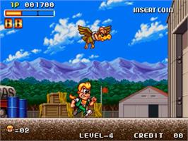 In game image of Spin Master on the SNK Neo-Geo MVS.
