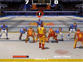 In game image of Dirty Pigskin Football on the Sammy Atomiswave.