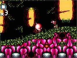 In game image of Chuck Rock 2 on the Sega Game Gear.