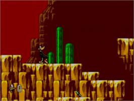 In game image of Daffy Duck in Hollywood on the Sega Game Gear.