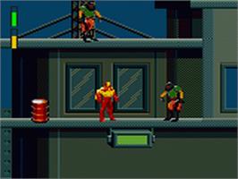 In game image of Iron Man / X-O Manowar in Heavy Metal on the Sega Game Gear.