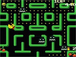 In game image of Ms. Pac-man on the Sega Game Gear.