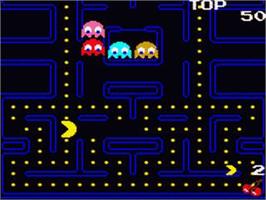 In game image of Pac-man on the Sega Game Gear.