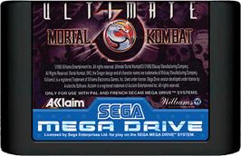 Cartridge artwork for Ultimate Mortal Kombat 3 on the Sega Genesis.