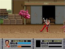 In game image of Alien Storm on the Sega Genesis.