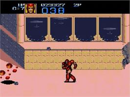 In game image of Captain America and The Avengers on the Sega Genesis.