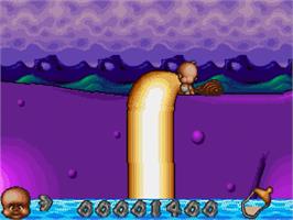 In game image of Chuck Rock 2: Son of Chuck on the Sega Genesis.