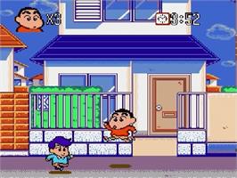 In game image of Crayon Shin-chan - Arashi O Yobu Enji on the Sega Genesis.