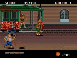 In game image of Dj Boy on the Sega Genesis.