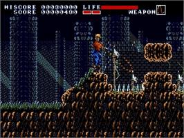 In game image of Earnest Evans on the Sega Genesis.