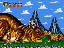 In game image of Joe And Mac - Caveman Ninja on the Sega Genesis.