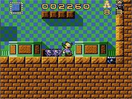 In game image of Krusty's Fun House on the Sega Genesis.