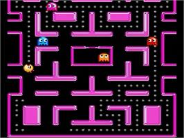 In game image of Ms. Pac-man on the Sega Genesis.
