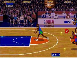 In game image of NBA Jam on the Sega Genesis.