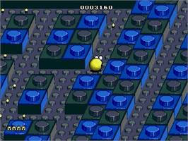 In game image of Pac-Mania on the Sega Genesis.