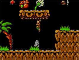 In game image of Chuck Rock on the Sega Master System.