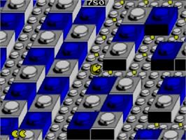 In game image of Pac-mania on the Sega Master System.