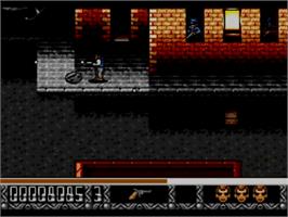In game image of Predator 2 on the Sega Master System.