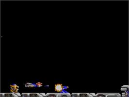 In game image of R-type on the Sega Master System.