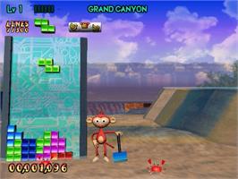 In game image of Tetris on the Sega Naomi.