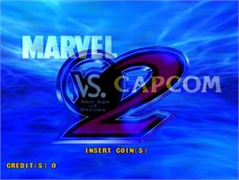 Title screen of Marvel Vs. Capcom 2 - New Age Of Heroes on the Sega Naomi.