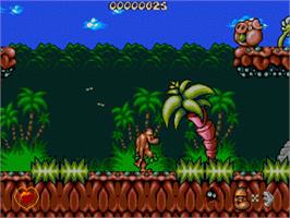 In game image of Chuck Rock on the Sega Nomad.