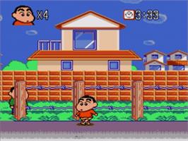 In game image of Crayon Shin-chan - Arashi O Yobu Enji on the Sega Nomad.