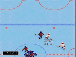In game image of NHL 97 on the Sega Nomad.