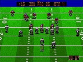 In game image of Nfl Quarterback Club '95 on the Sega Nomad.