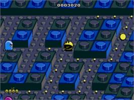 In game image of Pac-mania on the Sega Nomad.