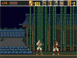 In game image of Revenge of Shinobi, The on the Sega Nomad.