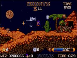 In game image of Wiz 'n' Liz: The Frantic Wabbit Wescue on the Sega Nomad.