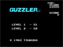 Title screen of Guzzler on the Sega SG-1000.