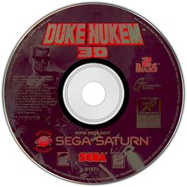 Cartridge artwork for Duke Nukem 3D on the Sega Saturn.