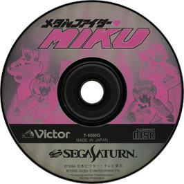 Cartridge artwork for Metal Fighter Miku on the Sega Saturn.