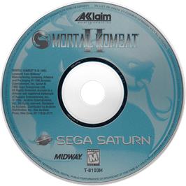 Cartridge artwork for Mortal Kombat 2 on the Sega Saturn.
