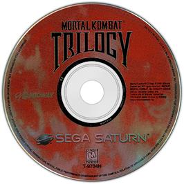 Cartridge artwork for Mortal Kombat Trilogy on the Sega Saturn.