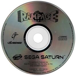 Artwork on the Disc for Rampage: World Tour on the Sega Saturn.
