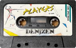 Cartridge artwork for Denizen on the Sinclair ZX Spectrum.
