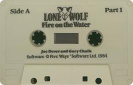 Cartridge artwork for Fire On The Water on the Sinclair ZX Spectrum.