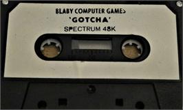 Cartridge artwork for Gotcha on the Sinclair ZX Spectrum.