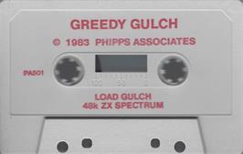 Cartridge artwork for Greedy Gulch on the Sinclair ZX Spectrum.