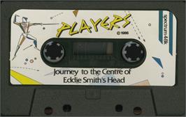 Cartridge artwork for Journey To The Centre Of Eddie Smith's Head on the Sinclair ZX Spectrum.