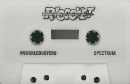 Cartridge artwork for Knuckle Busters on the Sinclair ZX Spectrum.