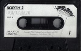 Cartridge artwork for Korth Trilogy, The 2 - Besieged on the Sinclair ZX Spectrum.