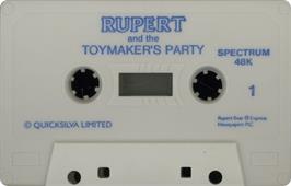 Cartridge artwork for Rupert And The Toymaker's Party on the Sinclair ZX Spectrum.