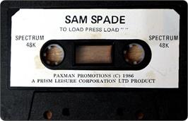 Cartridge artwork for Sam Spade on the Sinclair ZX Spectrum.