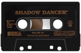Cartridge artwork for Shadow Dancer on the Sinclair ZX Spectrum.