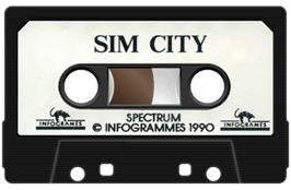 Cartridge artwork for Sim City on the Sinclair ZX Spectrum.
