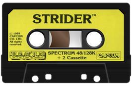 Cartridge artwork for Strider on the Sinclair ZX Spectrum.